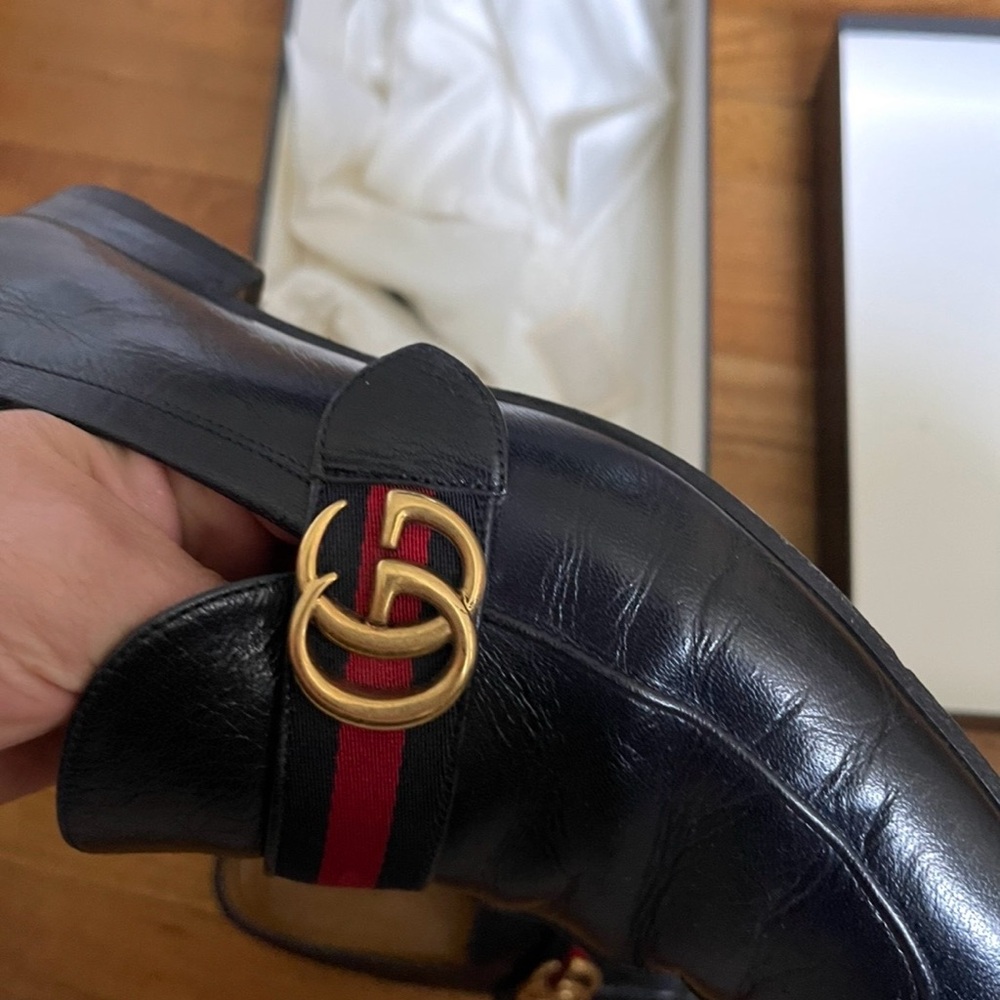 Gucci Black Leather Loafers with Gold Emblem